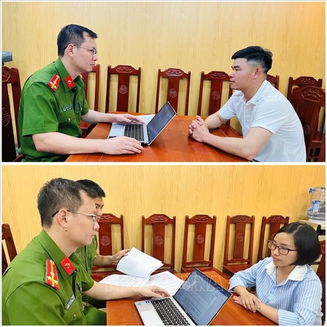 Đối tượng Lê Văn Quốc và Hà Thị Thục Huyền làm việc với cơ quan Công an. Ảnh TTXVN phát 